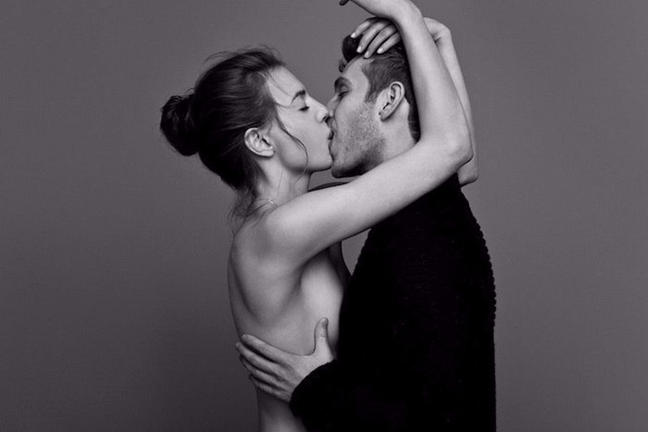 Man and woman kissing naked