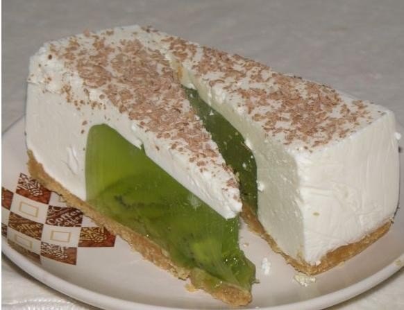 Желейный тортик из киви и сметаны без выпечки.Ингредиенты:Корж: 400 г песочного печенья 150 г ...