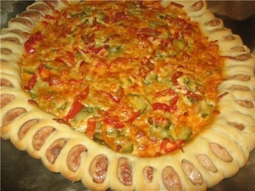 Пицца с вкусным краешком.Ингредиенты:- 150мл тёплой воды- 0.5 ч.л. сахара- 0.5 ч.л. соли- 2 ст. ...