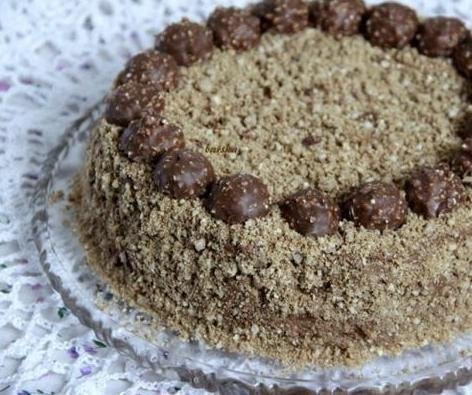 Торт Ferrero Rocher.Ингредиенты блюда:Яйцо 5 шт Разрыхлитель теста 2 ч. л.Орехи (фундук молотый) 3/4 ...