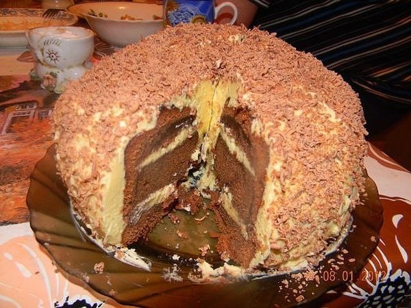 Торт - лентяй.Масло 140 гр,Сахар 140 гр,Шоколад 200 гр,Мука 120 гр,Яйца 6 шт,Способ ...