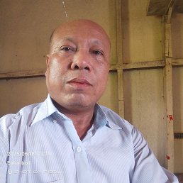 Myint Khin, 49, 